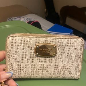 Michael Kors Wristlet. Good Condition. Vanilla with Gold Accents